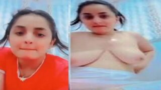 Orange tops girl stripping and showing big boobs